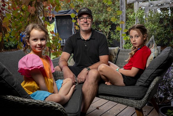 Lukas Winward, with daughters Maggie (left) and Layla.