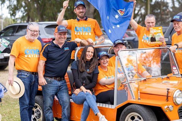 One Nation candidate Darren Hercus (second from left) with senior party figures and supporters on Saturday.