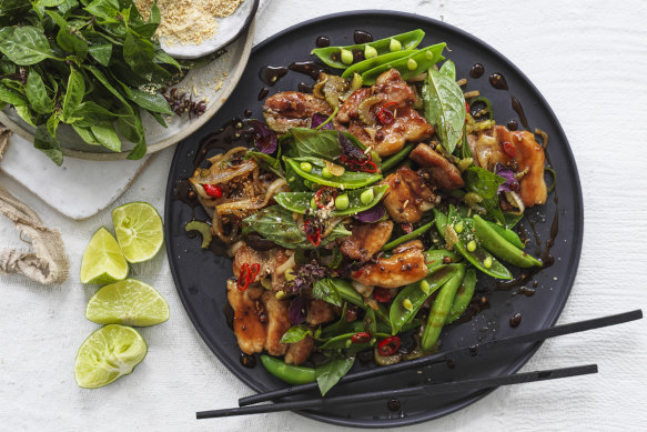 Stir-fried pork belly with chillies and sugar snap peas.