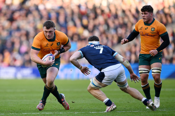 Angus Bell carries the ball at Murrayfield.