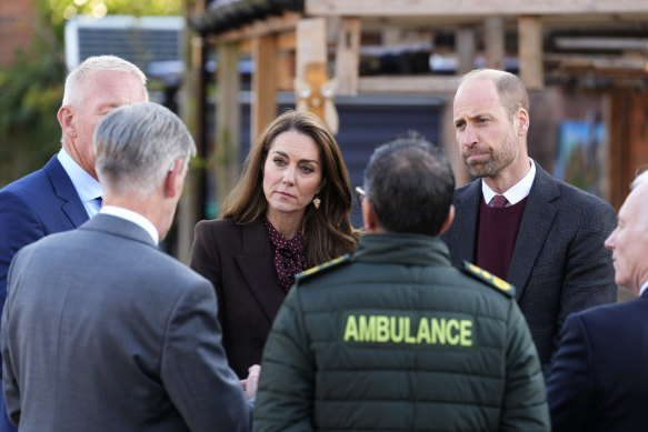 The Prince and Princess of Wales speak with emergency workers at Southport Community Centre on Thursday.