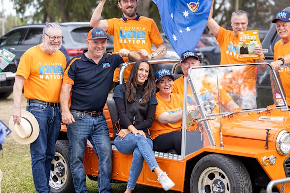 One Nation candidate in Nepean Darren Hercus (blue), senior party figures including Rikkie-Lee Tyrrell and Bernie Finn, and his supporters during the May election.