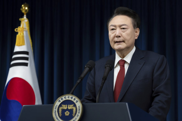 South Korea President Yoon Suk Yeol apologises for his actions at the presidential office in Seoul on Saturday.