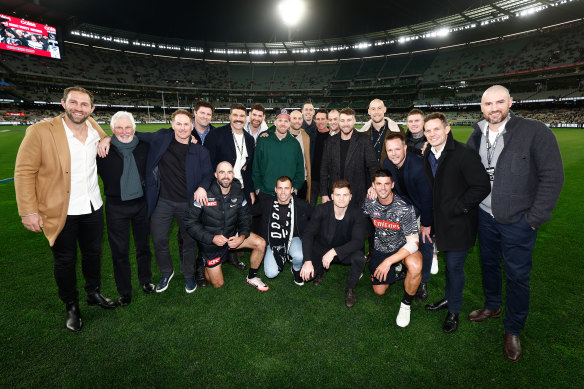 The Magpies 2010 premiership team pose for a photograph.