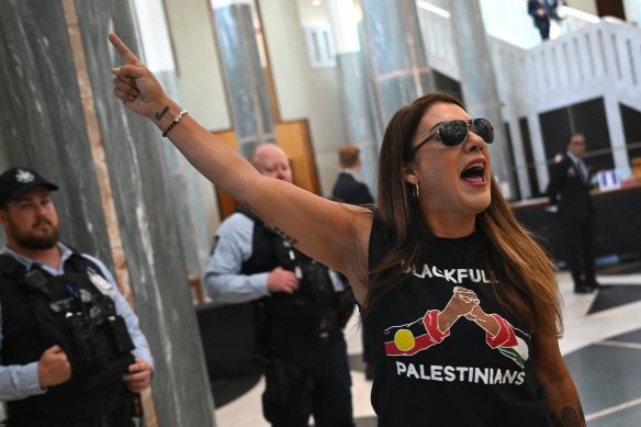 Senator Lidia Thorpe protests in the marble foyer at Parliament House on Thursday.