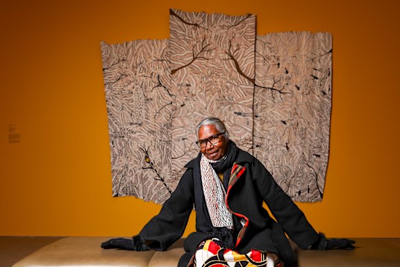 Senior artist Yalmakany Marawili with her artwork Meditjin ga Borum 2024 (Edge of the jungle).