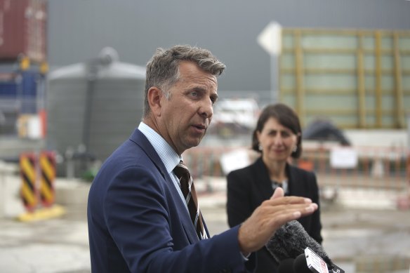 Transport Minister Andrew Constance, pictured with Premier Gladys Berejiklian, says NSW should subsidise the entry of electric vehicles into the NSW market.