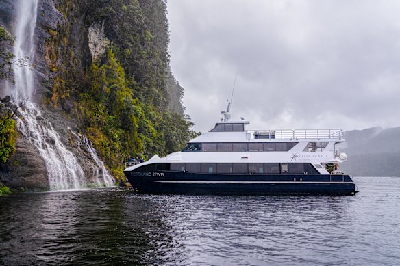 The Fiordland Jewel takes guests up close to one of the many waterfalls of Fiordland.