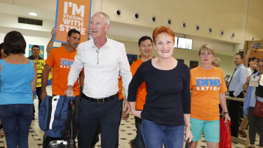 One Nation leader and senator Pauline Hanson is greeted by state leader Steve Dickson and party supporters at the Brisbane International Airport on Sunday.