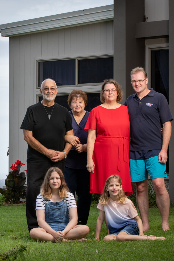 Leah Salo (second from right) with husband Tim, her parents Mark and Dixie, and kids Annalia (at left) and Savanna at their Gold Coast home, which incorporates shared and separate family spaces. 