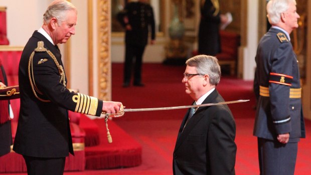 The Prince of Wales makes Lynton Crosby a Knight Bachelor of the British Empire at Buckingham Palace in May, 2016.