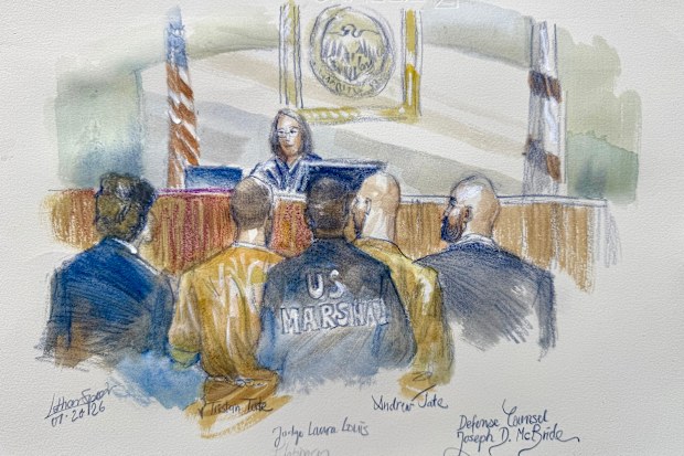 In this courtroom sketch Andrew and Tristan Tate appear with their attorneys before judge Lauren Louis in Miami federal court.