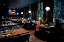 The Sanderson's plush booths and dining room.