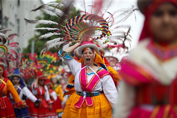 Dancers from Bolivia perform in the street parade of the Carnival of Cultures in Berlin, Germany.