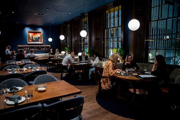 The Sanderson's plush booths and dining room.