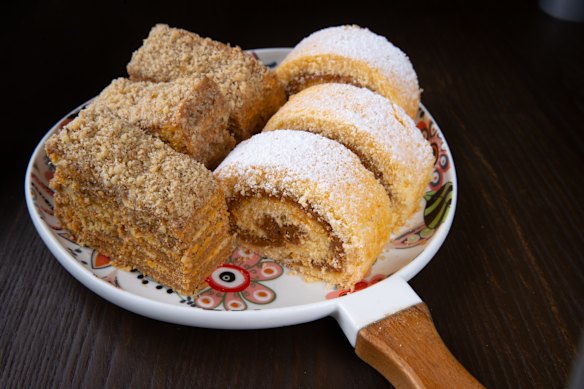 Torta milhojas (left) and brazo de reina desserts.