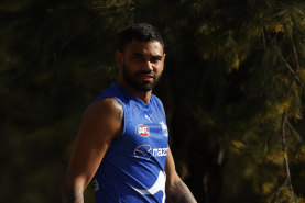 Tarryn Thomas is serving an 18-match AFL suspension and was sacked by North Melbourne.