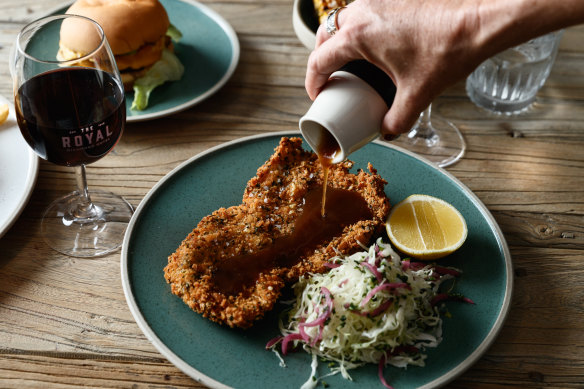 The Royal Richmond Hotel’s chicken schnitzel, gravy and slaw.