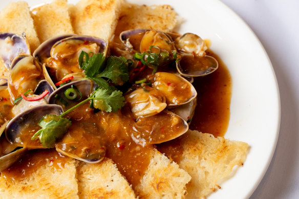 Pipis in XO sauce with fried vermicelli: the noodles loosen and soften, forming a dish in their own right.