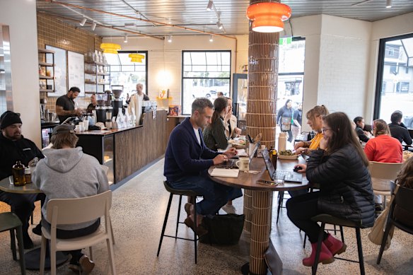 The 50-seat cafe plays music on vinyl and has a large communal table.