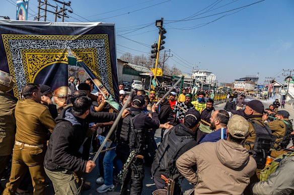 Indian policemen baton charge Kashirimi Shiite Muslim protester during a protest march against the U.S. and Israel, after Iran’s Supreme Leader Ayatollah Ali Khamenei was killed in Israeli and U.S. airstrikes on March 2, 2026 in Srinagar, India. Security forces in Indian-administered Kashmir sealed off Srinagar’s commercial centre on Monday and fired teargas to disperse protests over the killing of Iranian Supreme Leader Ayatollah Ali Khamenei. 
