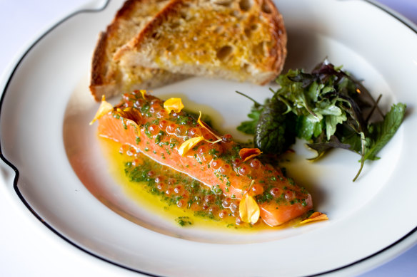 Confit Saikou salmon with smoked salmon caviar, verjus dressing and
sourdough. 