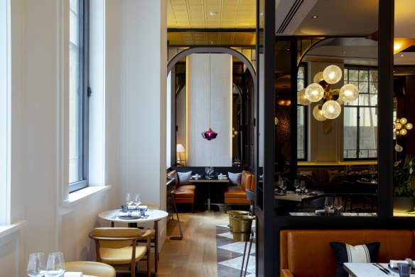 Leather banquettes, marble tiles and brass-bound tables result in a pretty grand brasserie.