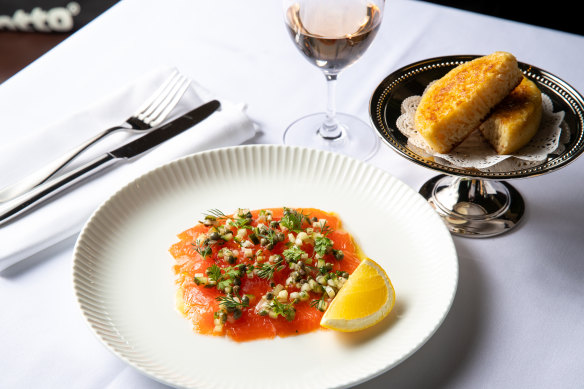 Ora King salmon gravalax with dill cucumber and sourdough crumpets.