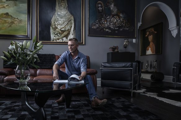 Andrew Turley with works from Sidney Nolan’s Africa series, including Gorilla, at left. 