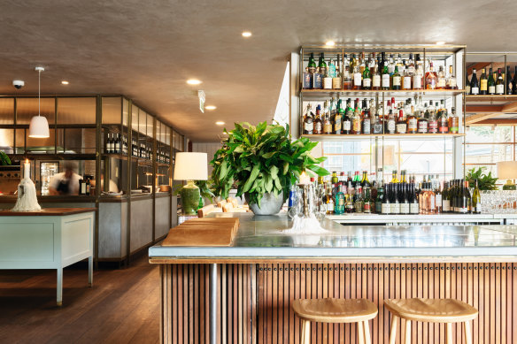 The sun-drenched dining room at Hotel Centennial.
