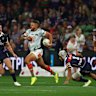 Latrell Mitchell of the Rabbitohs runs with the ball during the round eight NRL match between Melbourne Storm and South Sydney Rabbitohs at AAMI Park, on April 25, 2026, in Melbourne, Australia.