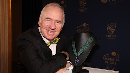 Allan Border with the medal that bears his name.