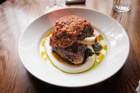 The signature lamb shoulder, now smothered in a sauce of almond and red pepper.