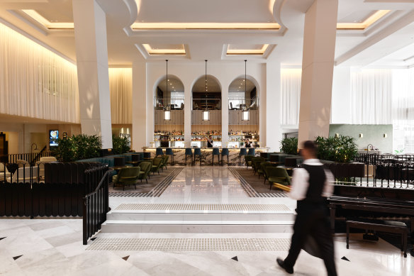 Three double-height arches provide a dramatic backdrop to the bar at Arches on Market.