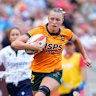 Maddison Levi charges towards the try line against France.
