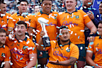 Brandon Paenga-Amosa of the Wallabies holds up the trophy.