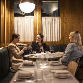 A deli greets visitors but around the corner is an intimate dining room.