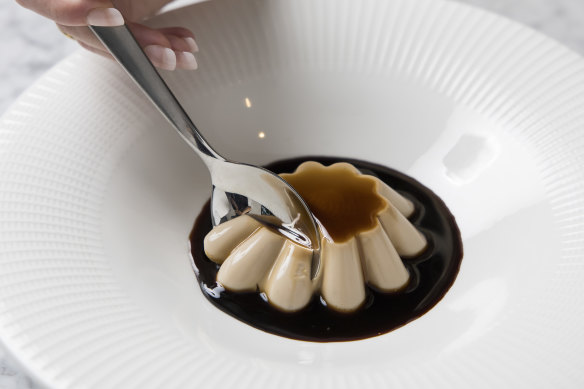 Japanese black sugar caramel poured over a goat’s milk steamed pudding enlivened with smoked tea. 