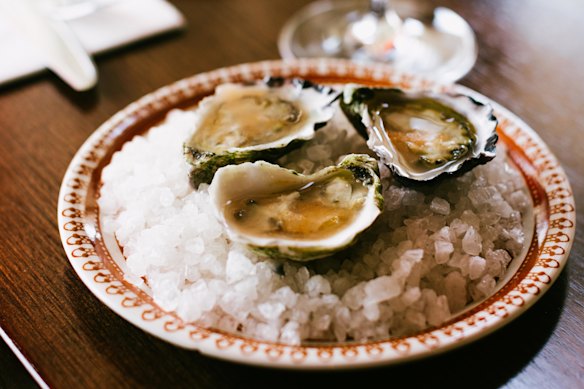 Get happy hour oysters and champagne at Gemini this winter.