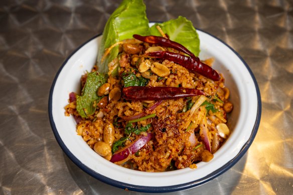 Unskippable: Yum naem khao tod.