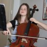 Student Eleni Cole practises cello at home. 