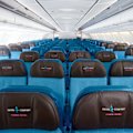 Extra Comfort seats make up the first rows of the economy cabin, but it’s no match for four seats to yourself.
