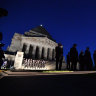 Anzac day: crowd down on previous years for Shrine dawn service