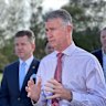 Queensland Sports Minister Tim Mander is facing questions after it was revealed he was enrolled to vote at property rented by a staffer. 