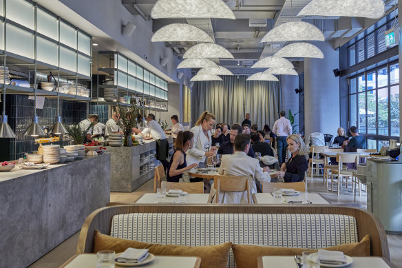 The dining room is decked out in soft oak and steel-blue hues.