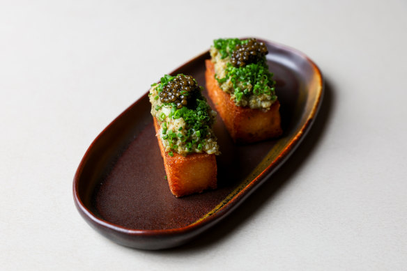 Crab toast with spanner crab meat, seaweed butter, avocado and N25 Kaluga caviar. 