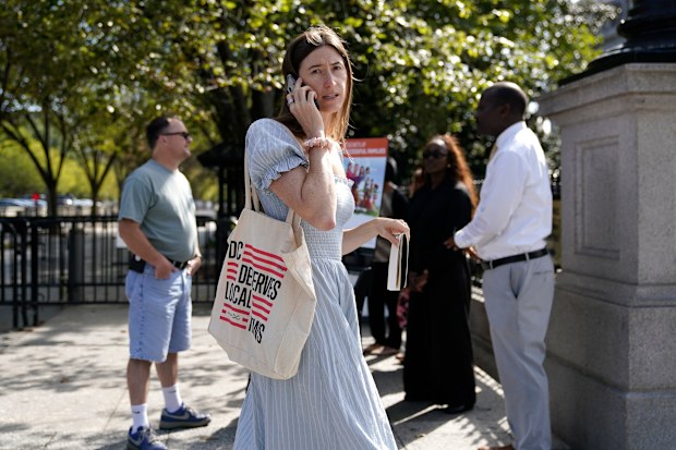Politico White House reporter Cheyenne Haslett is pictured near the White House complex after having her credential revoked following President Donald Trump’s ban 