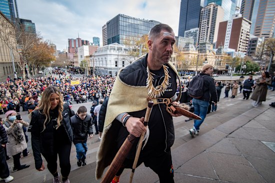 Yoorrook commissioner Travis Lovett led the “Walk for Truth” to the steps of parliament.