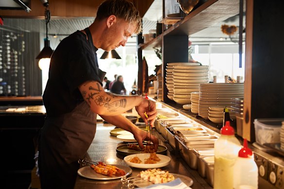 Prawns are prepared for a spin over coals.