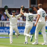 Alex Carey and Pat Cummins celebrate Jonny Bairstow’s wicket.